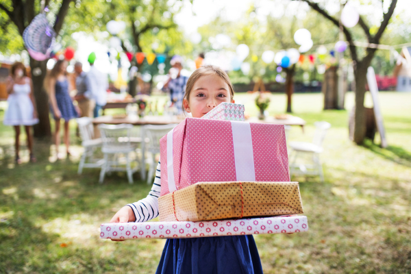 Family celebration outside in the backyard. Big garden party. Birthday party.