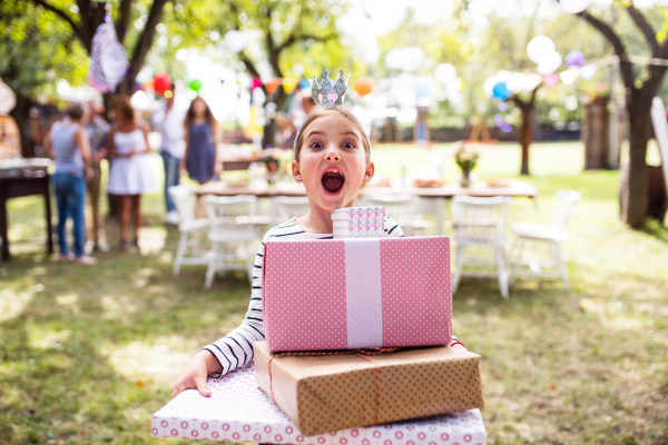 Family celebration outside in the backyard. Big garden party. Birthday party.