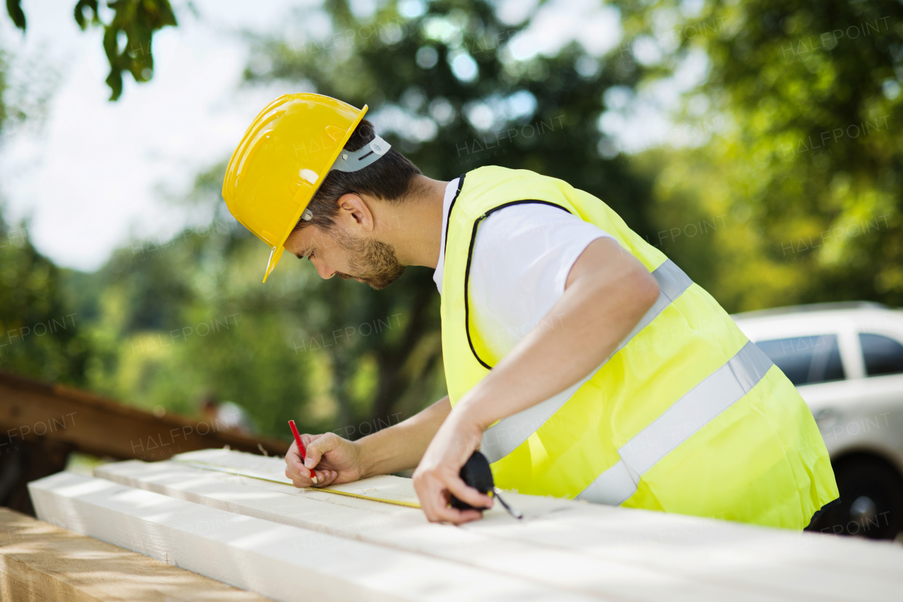 Two builders working on building.