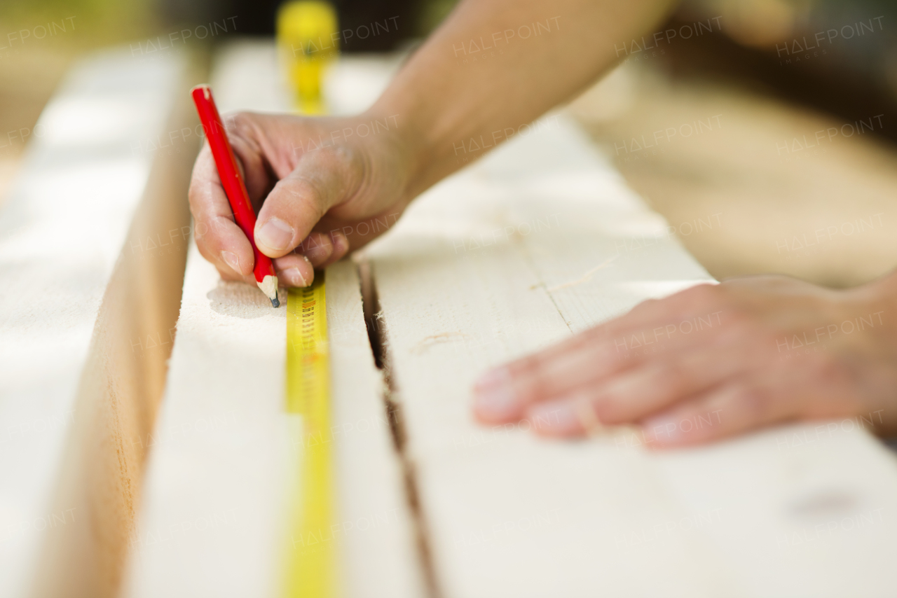 Two builders working on building.