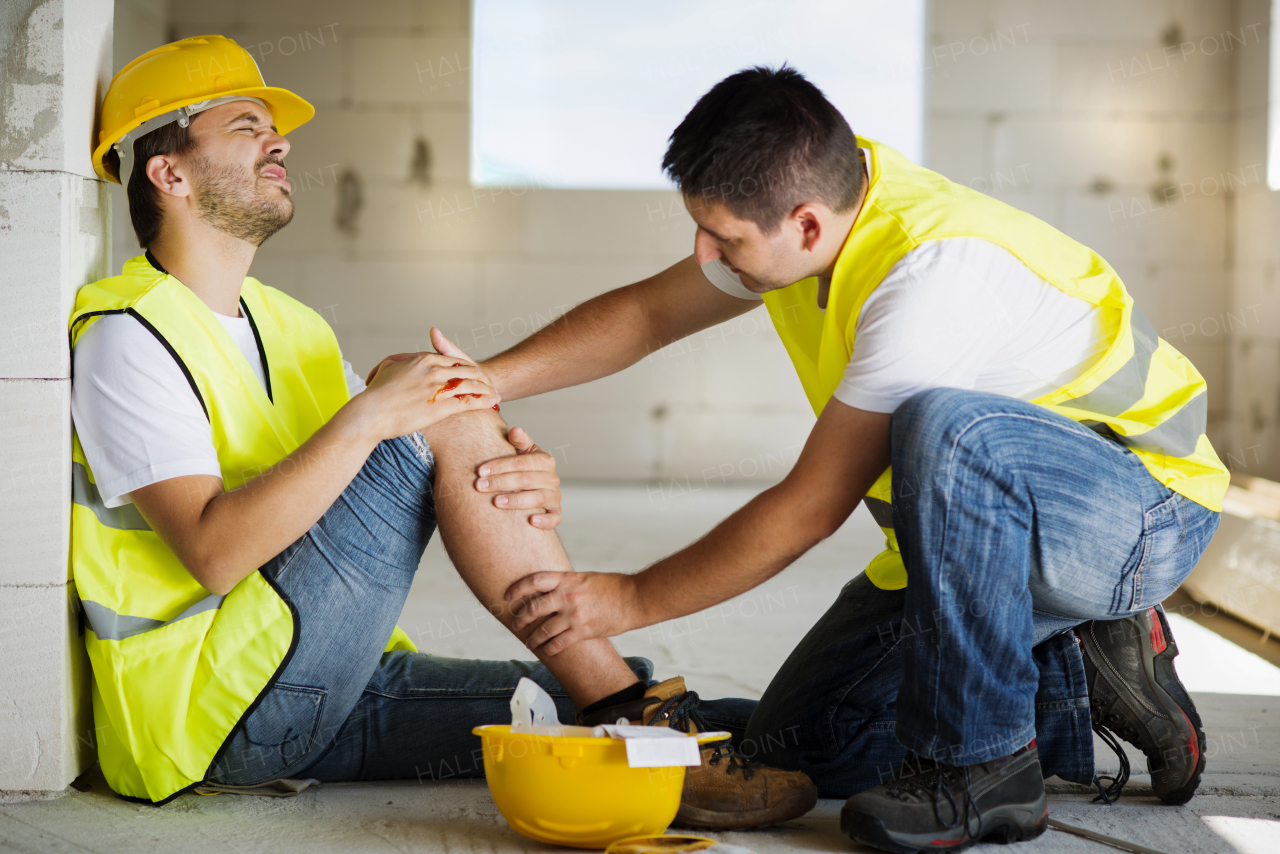 Two builders working on building.