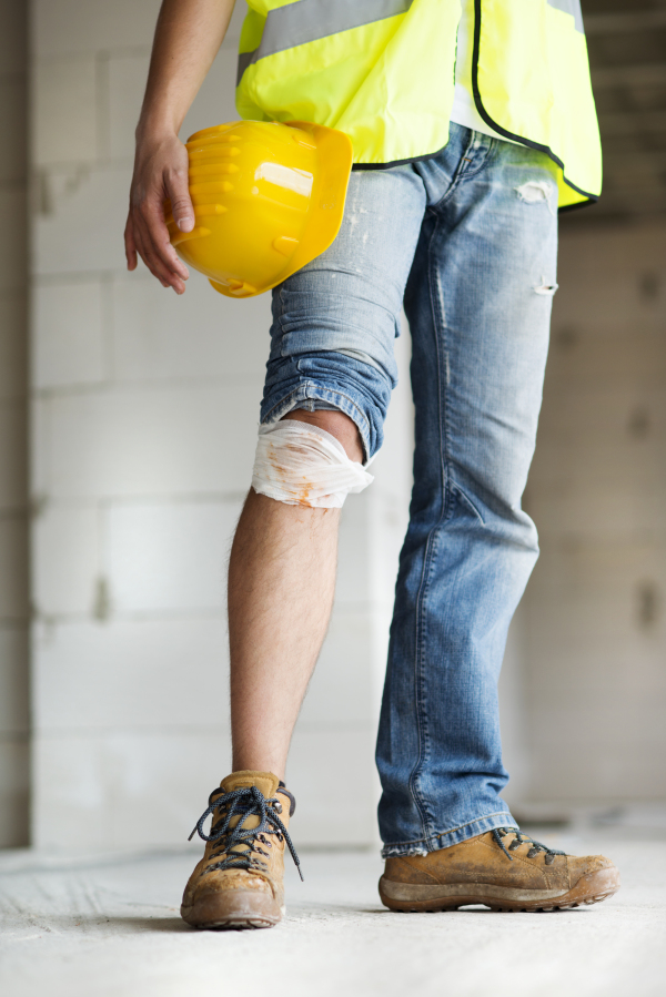 Two builders working on building.