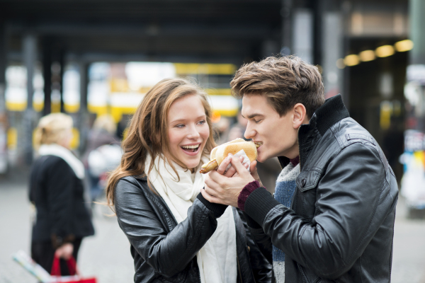 Beautiful young couple in city.