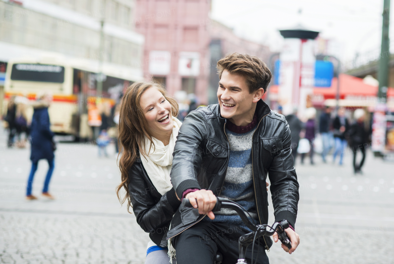 Beautiful young couple in city.