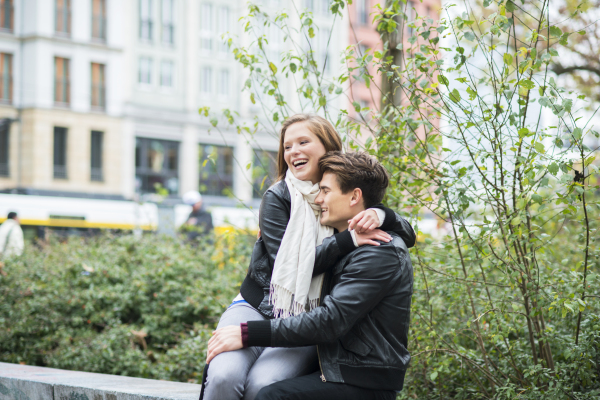 Beautiful young couple in city.