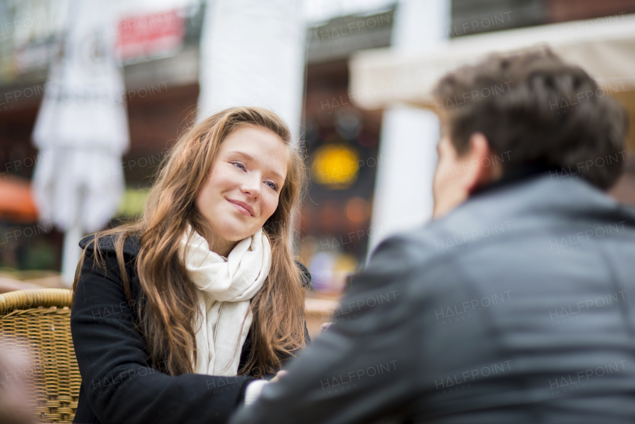 Beautiful young couple in city.