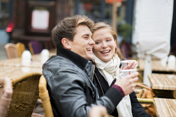 Beautiful young couple in city.