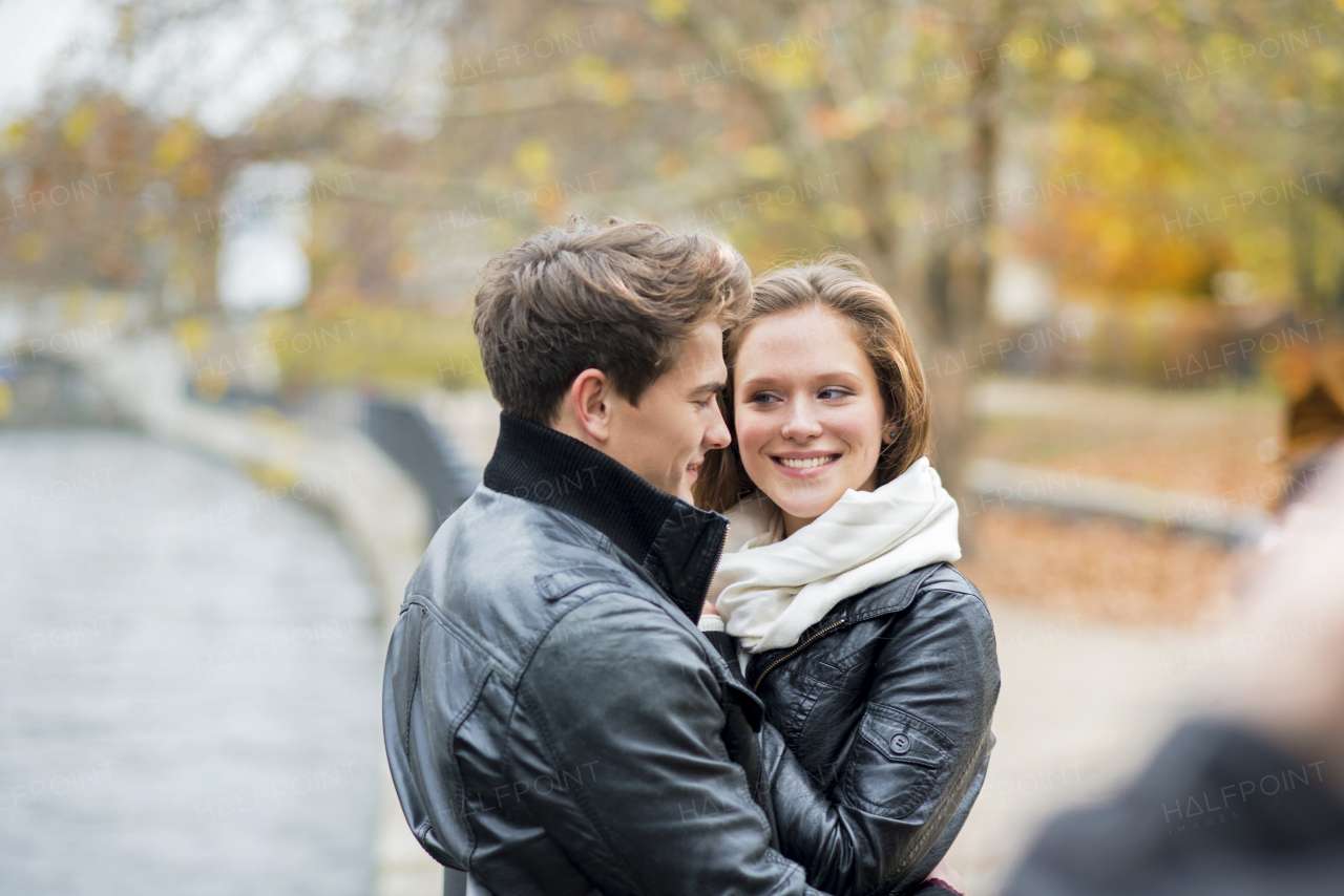 Beautiful young couple in city.