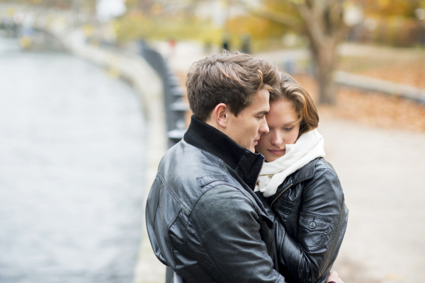 Beautiful young couple in city.