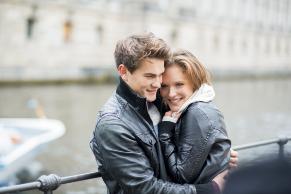 Beautiful young couple in city.