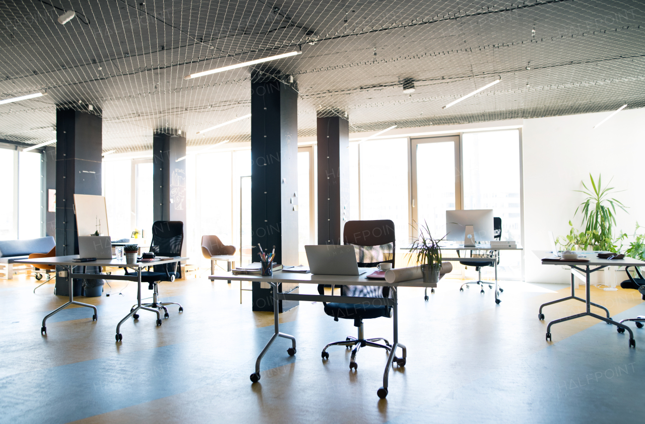 Big bright empty modern office after work. The interior of working office space.