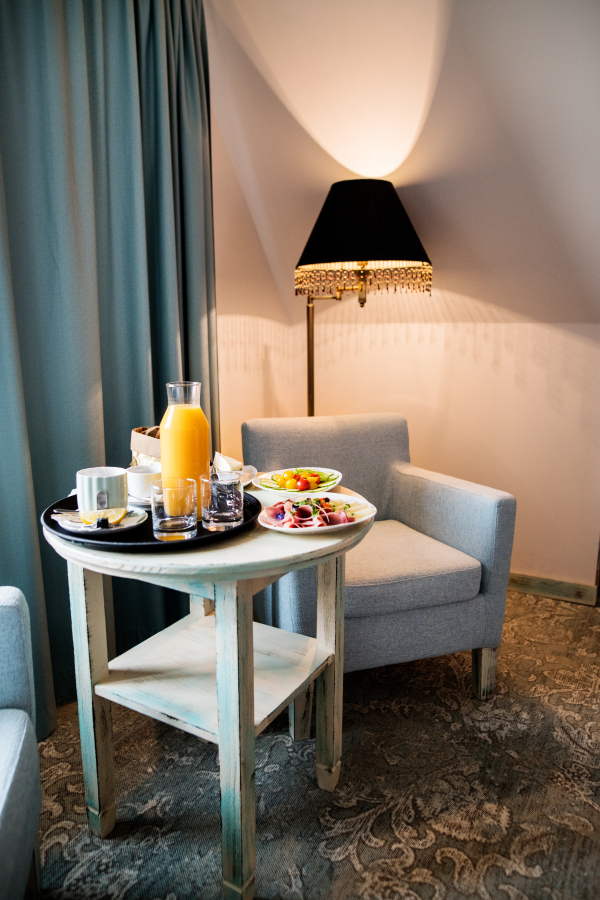 Food on a table in a hotel room. Breakfast in a hotel room.