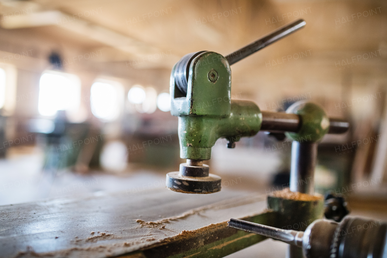 A woodworking equipment in carpentry workshop. Blurred background.