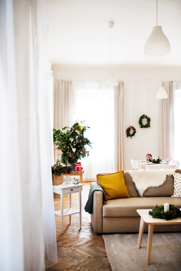 An interior of a living room at home at Christmas time.