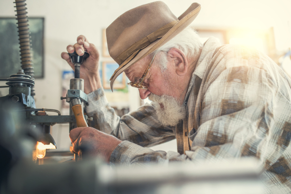 Senior man working at farm.