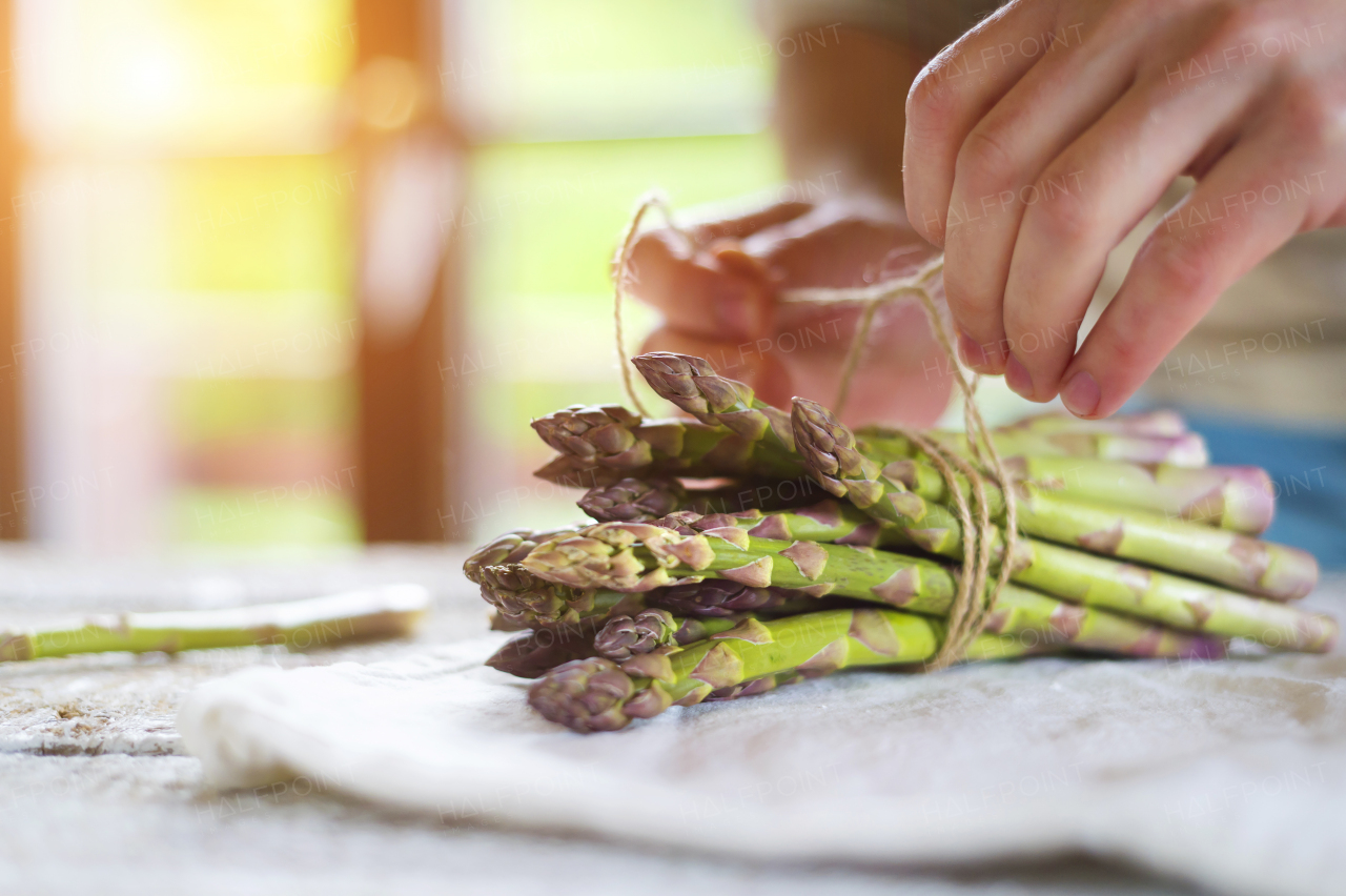 Young man cooking healthy food.