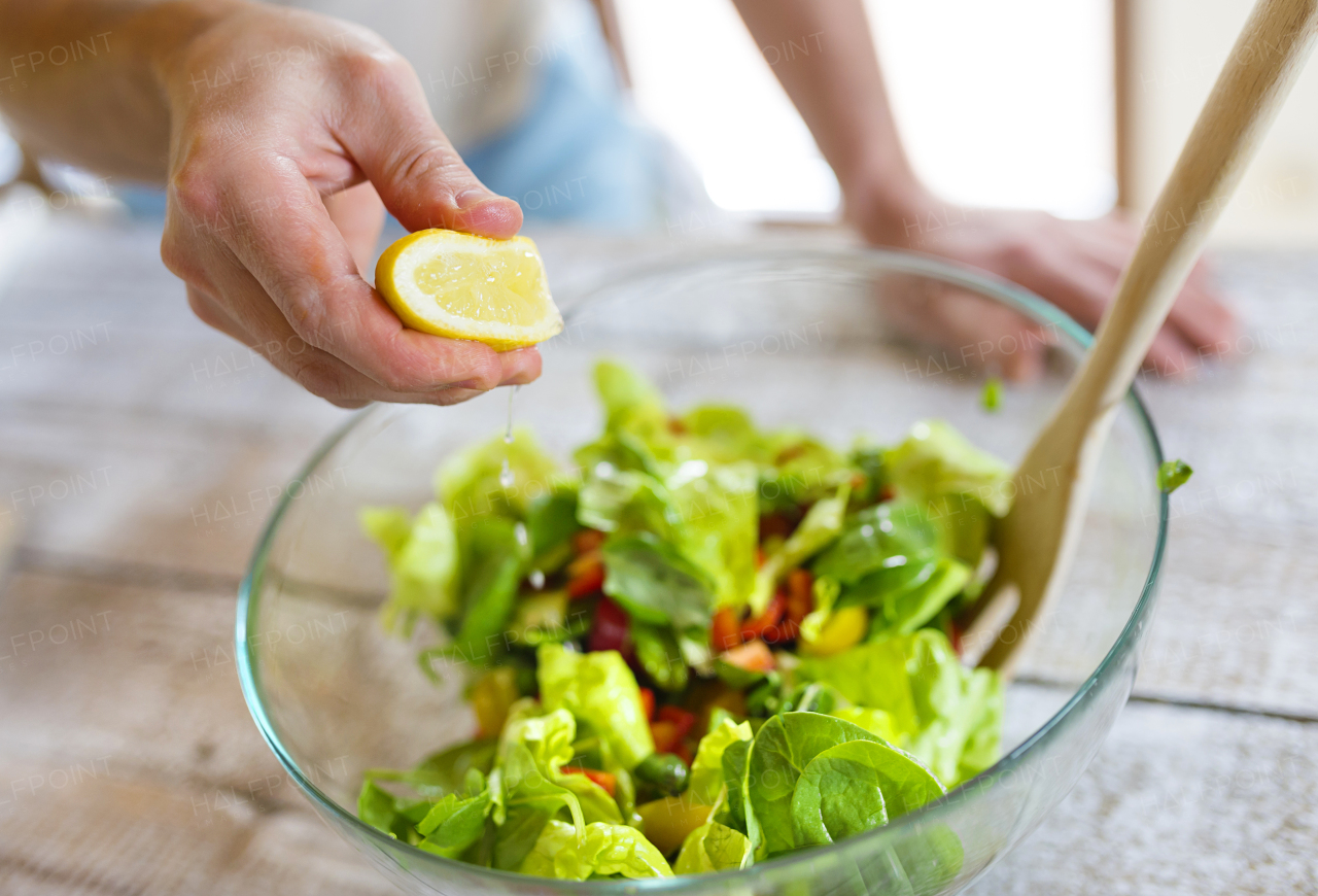 Young man cooking healthy food.