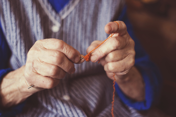 Active senior woman spending time at home.