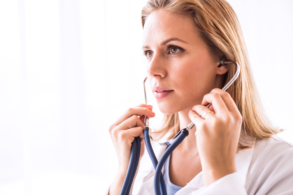 Portrait of a young female doctor with stethoscope.