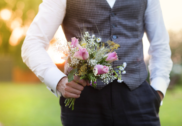 Beautiful wedding couple in summer nature.