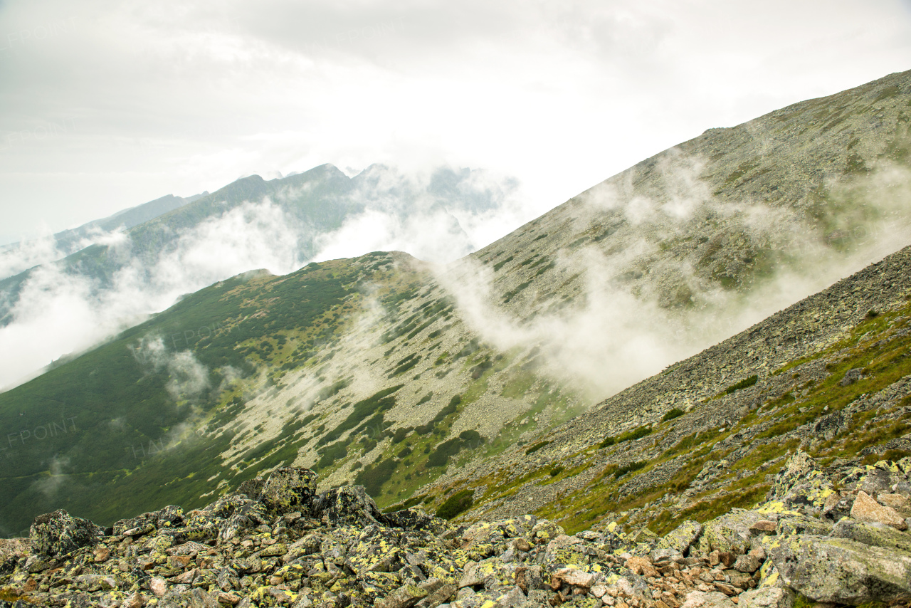 Foggy and cloudy mountains after rain, rainy misty day, High Tatras Slovakia. Beautiful mountain landscape.