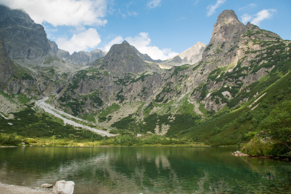 Beautiful scenery of high mountain with lake and high peak. High Tatras Slovakia