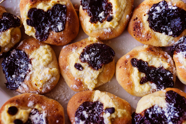 Freshly baked sweet buns filled with cottage cheese and jam.