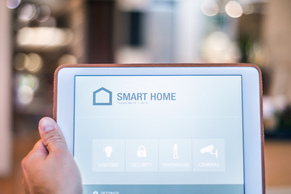 A tablet with smart home control system.