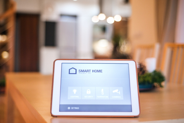 A tablet with smart home control system.