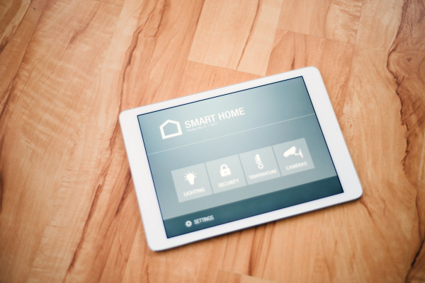 A tablet with smart home control system.