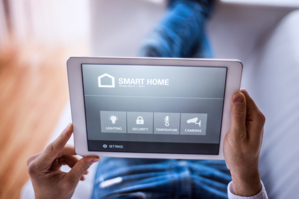 A tablet with smart home control system.