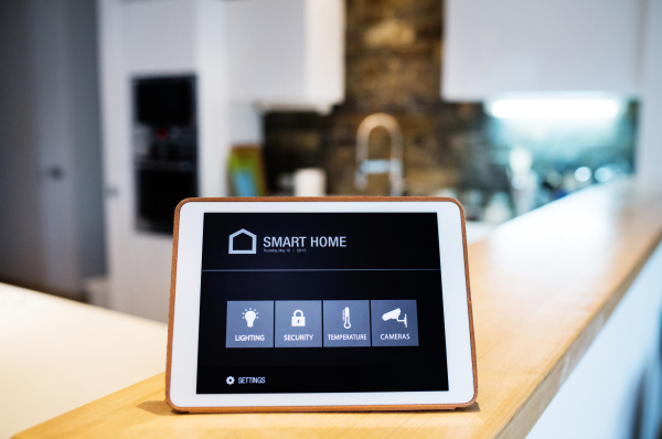 A tablet with smart home control system.