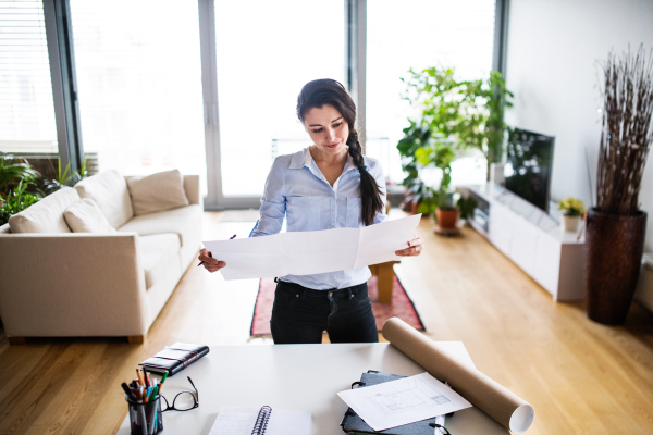 A portrait of a beautiful woman working. Home office.