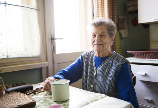 Active senior woman spending time at home.