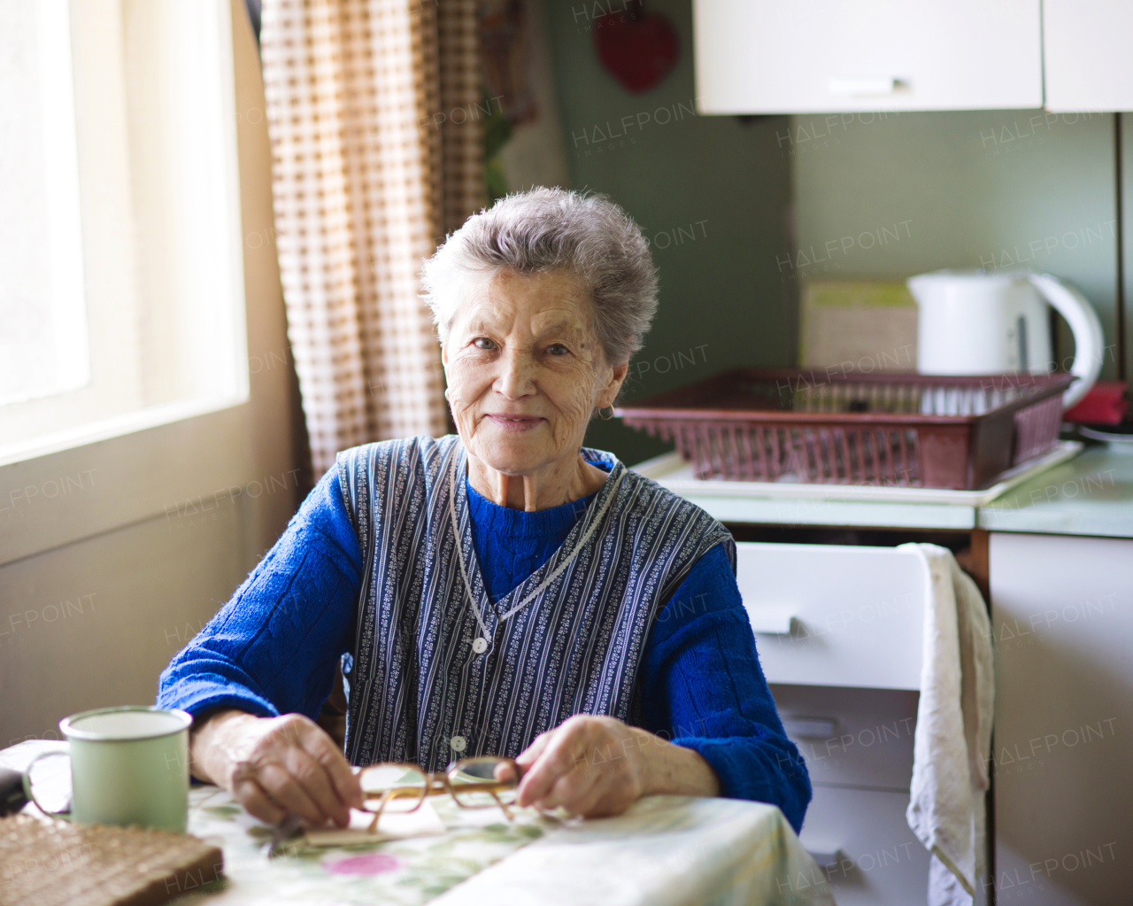 Active senior woman spending time at home.