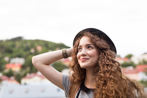 Beautiful young tourist in the old town.