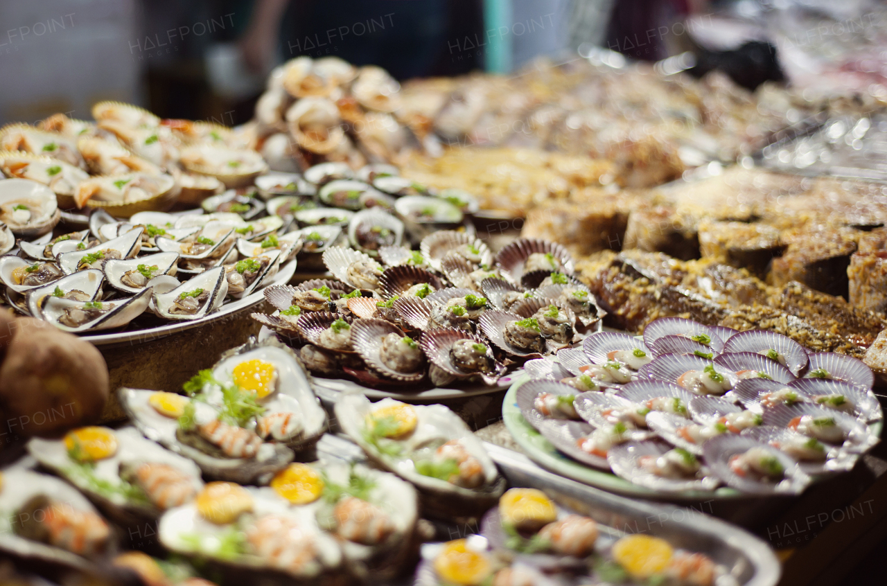 Vietnamese street market with beautifully prepared seafood