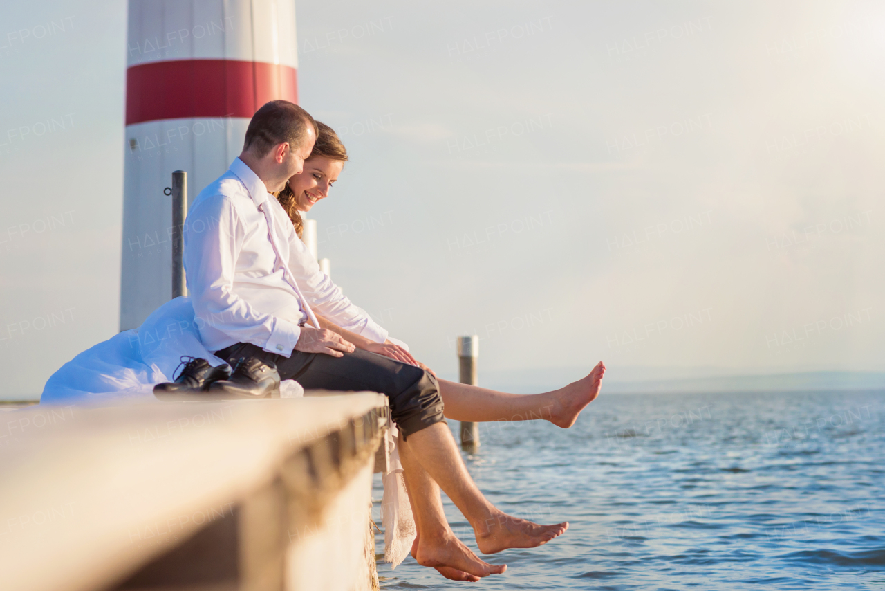 Beautiful young couple bya the sea.