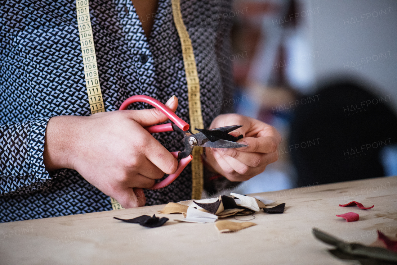 Unrecognizable creative woman working in a studio, startup business.