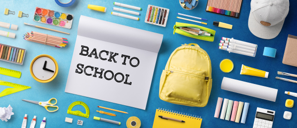 Flat lay top view of a bag and school supplies, back to school concept.