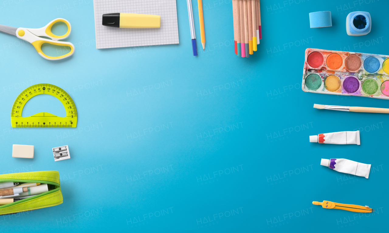 A flat lay top view of school supplies, back to school concept. Copy space.