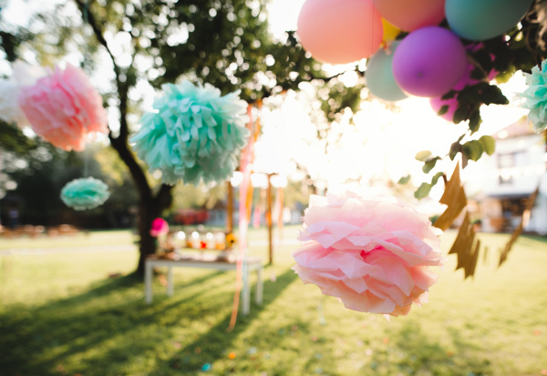 Decorated garden for birthday party outdoors in summer, celebration concept.