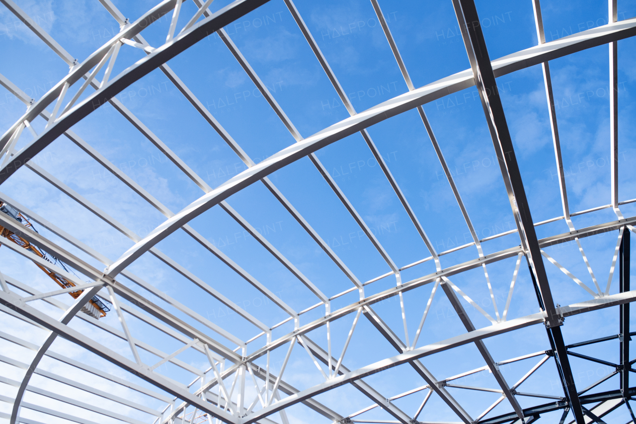 A construction site with a steel frame structures.