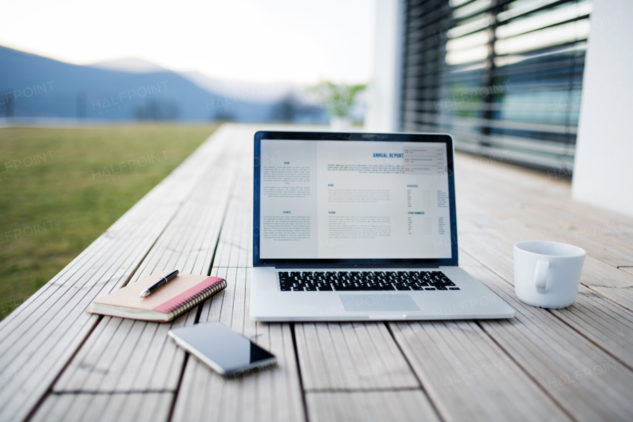 Working outdoors on patio in home office, corona virus and quarantine concept.