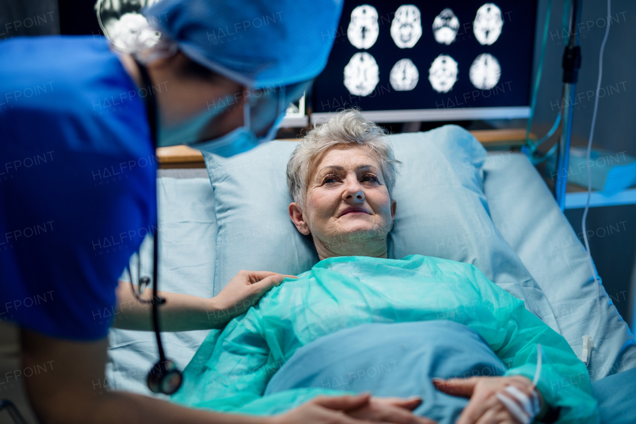 An infected patient in quarantine lying in bed in hospital, coronavirus concept.