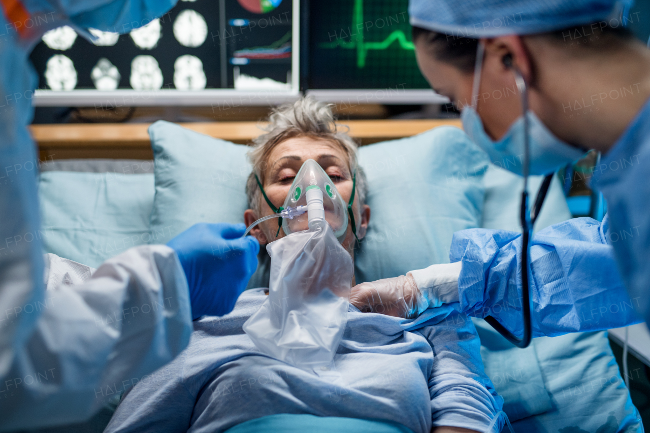 An infected patient in quarantine lying in bed in hospital, coronavirus concept.