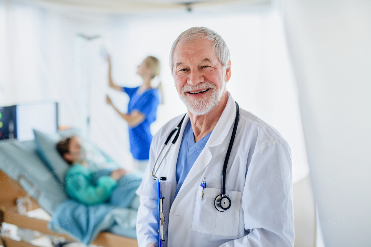 Portrait of doctor in quarantine in hospital, looking at camera. Coronavirus concept.