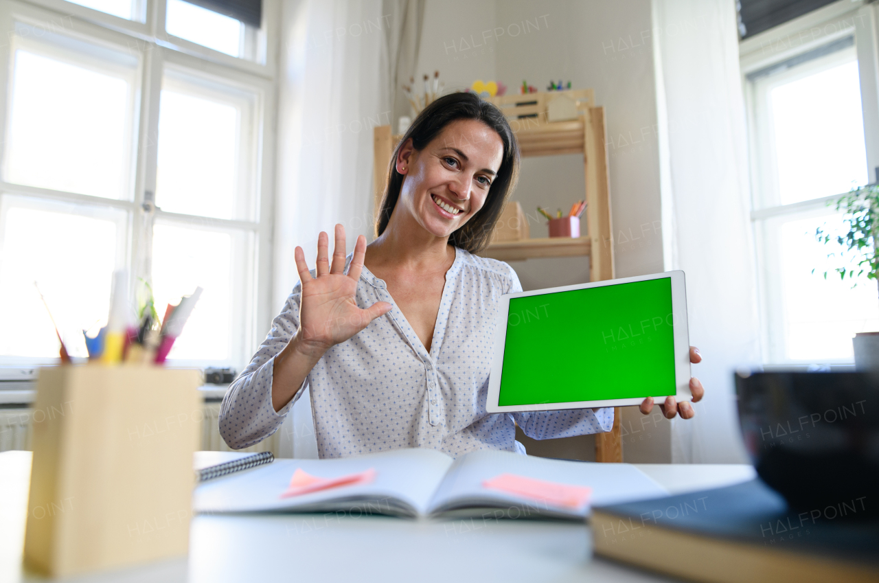 Portrait of woman teacher teaching online, coronavirus,online distance learning and keyable screen concept.