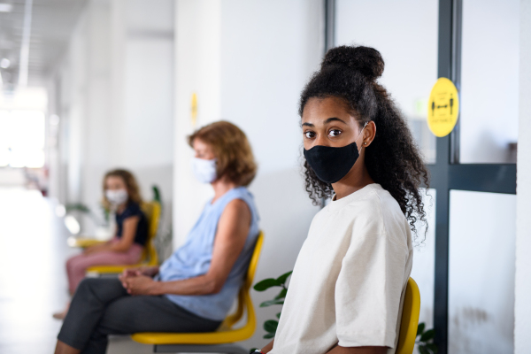 Portrait of young girl with face mask, coronavirus, covid-19 and vaccination concept.