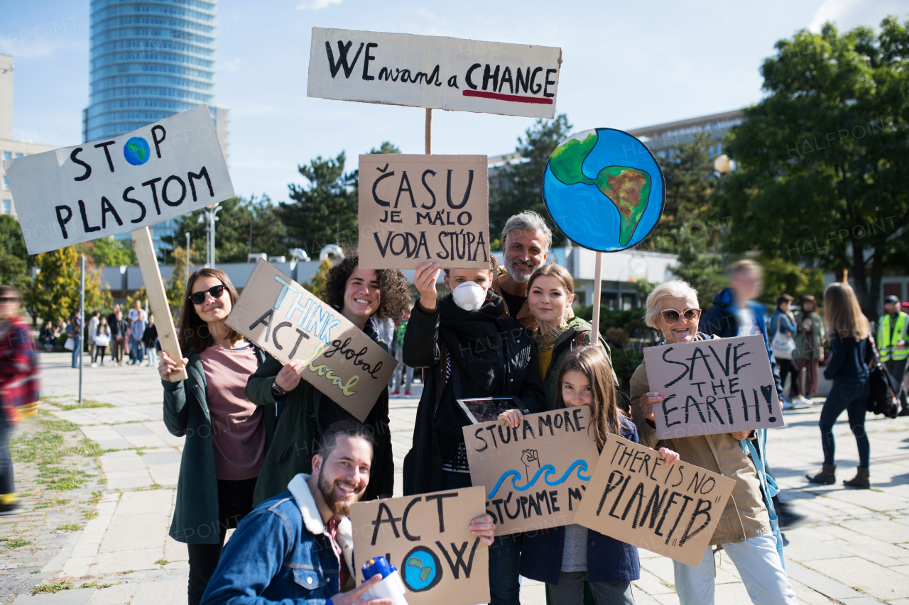 People with placards and posters on a global strike for climate change.